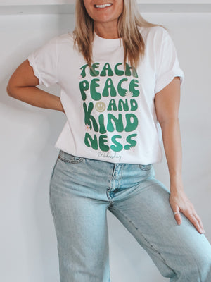 Lady in teach peace and kindness tee